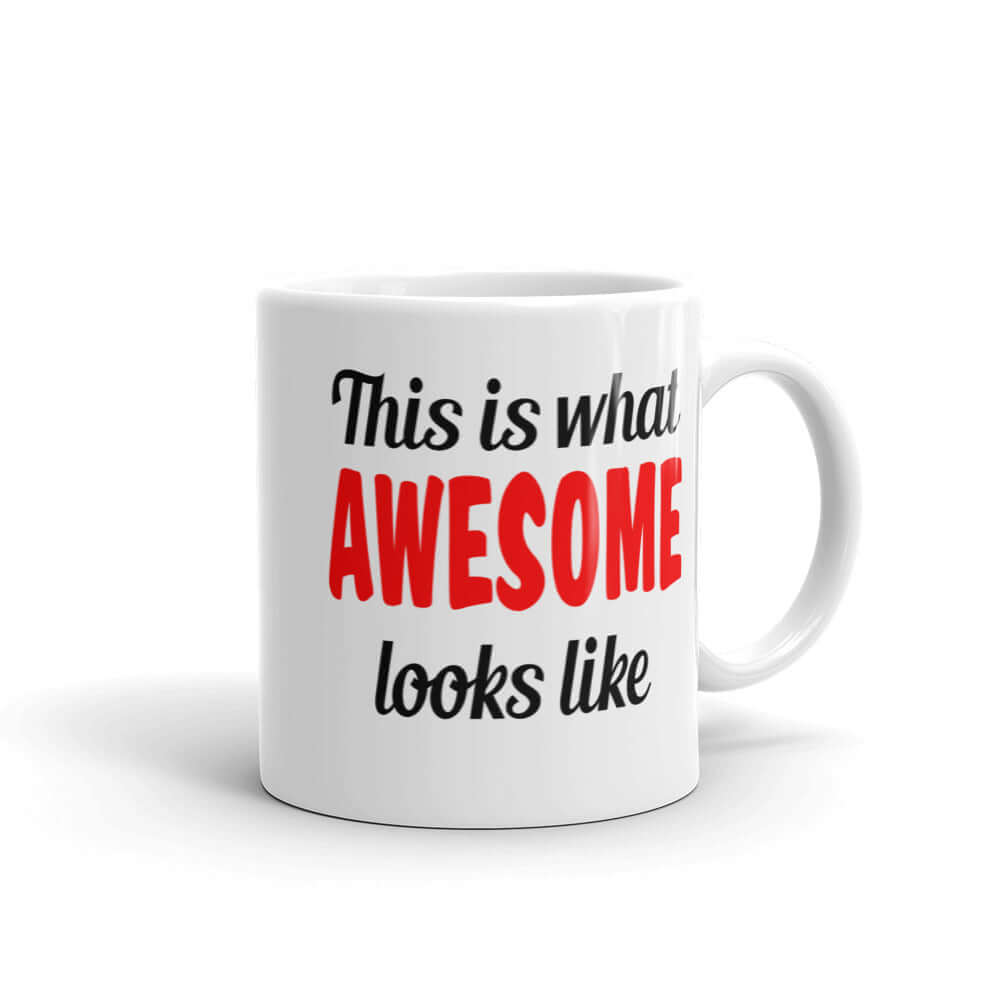 White ceramic mug with the words This is what awesome looks like printed on both sides. The word awesome is bright red. The rest of the text is black.