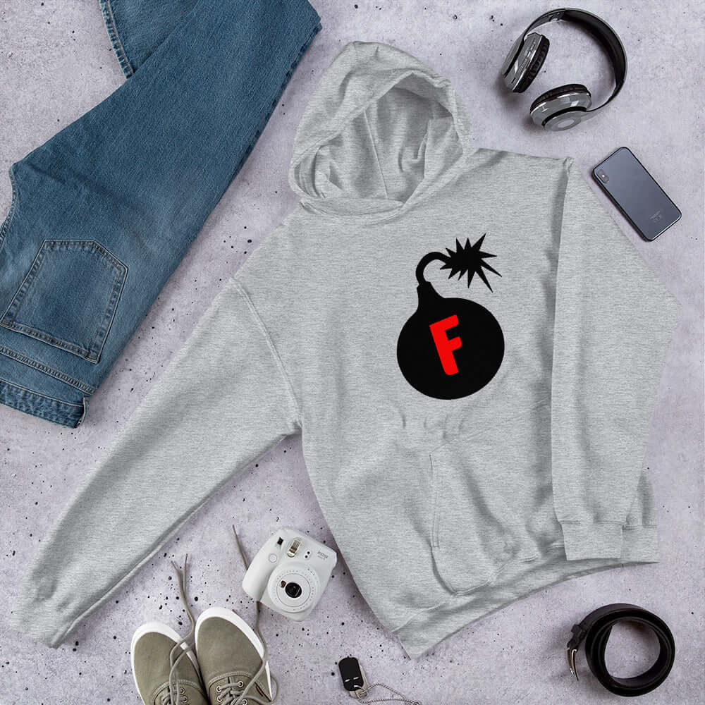 Light sport grey hoodie sweatshirt with an image of a bomb & the letter F printed in the center. The graphics are printed on the front of the hoodie.