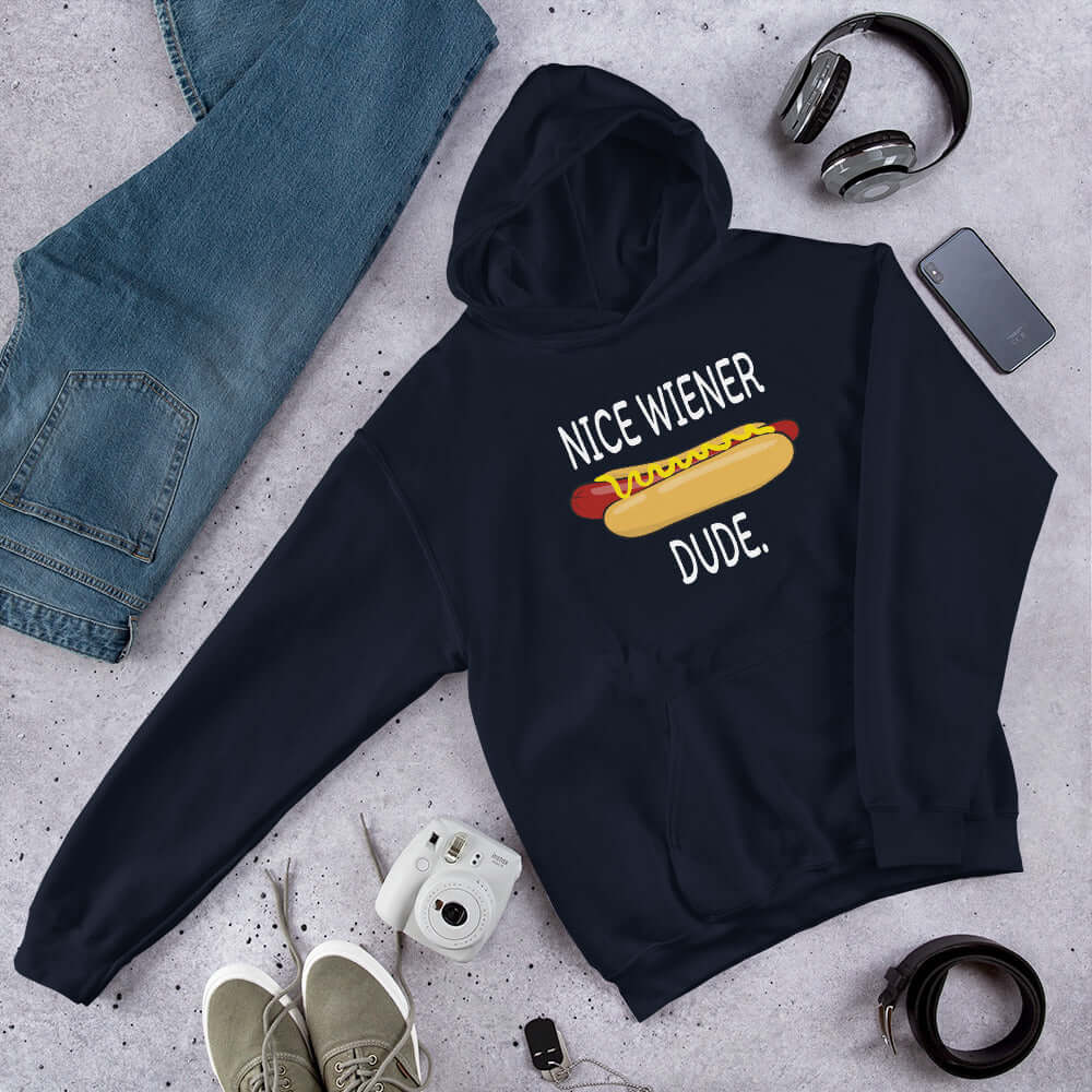Navy blue hoodie sweatshirt with an image of a hotdog and the phrase Nice wiener dude printed on the front.