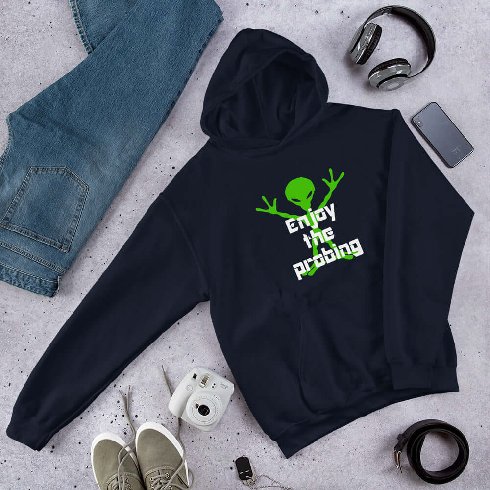 Navy blue hoodie sweatshirt with an image of an alien and the funny phrase Enjoy the probing printed on the front.