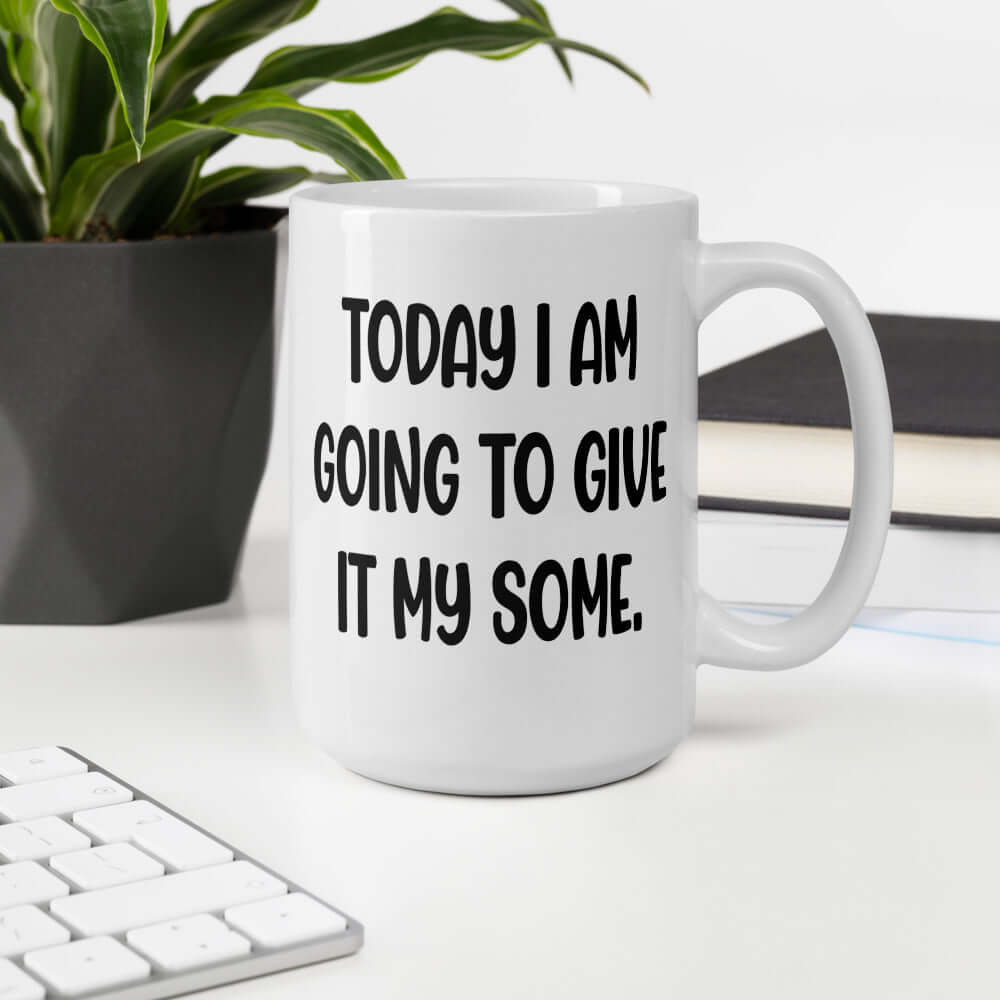 White ceramic coffee mug with with the funny phrase Today I'm going to give it my some printed on both sides.