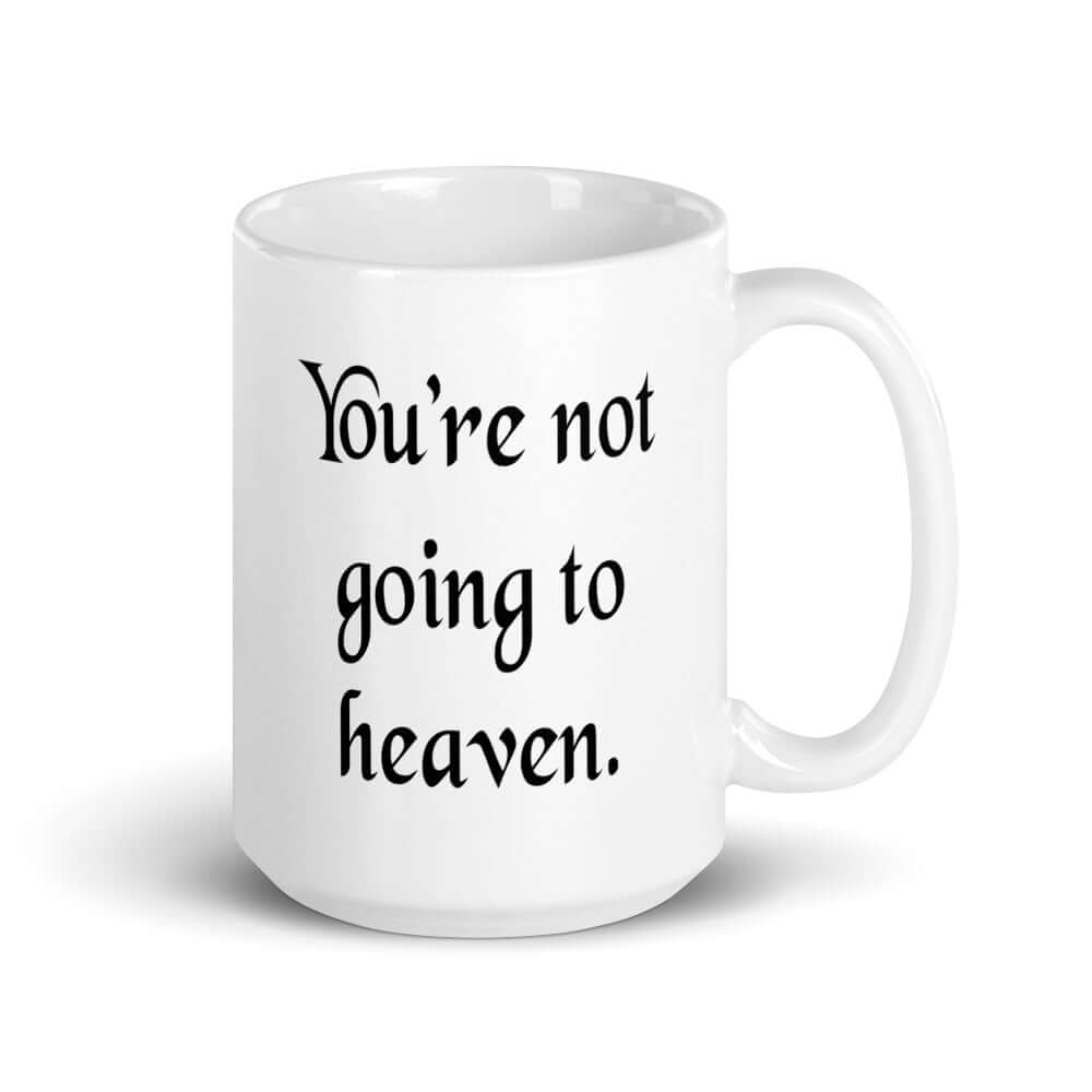 White ceramic coffee mug with the phrase You're not going to heaven printed on both sides.