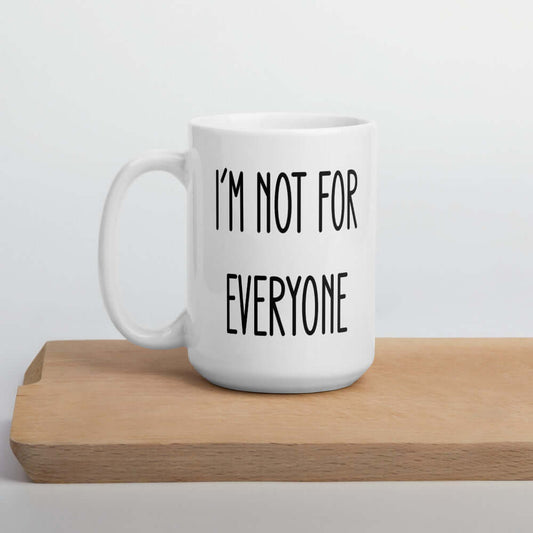 White ceramic coffee mug with the phrase I'm not for everyone printed on both sides.