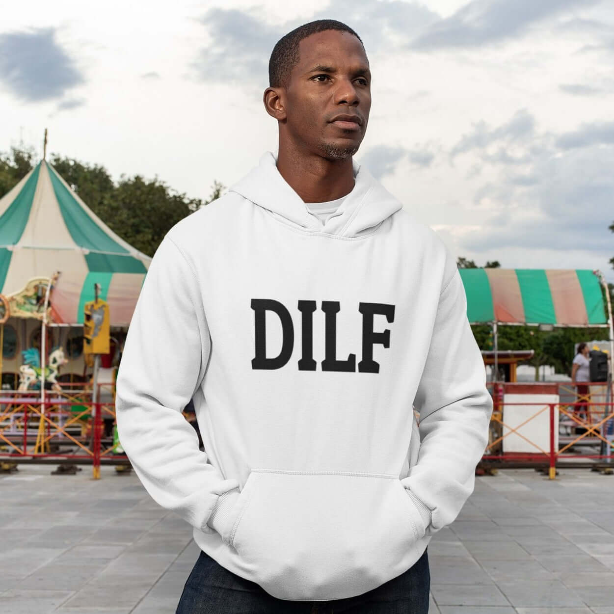 Man wearing a white hoodie sweatshirt with the acronym DILF printed on the front.