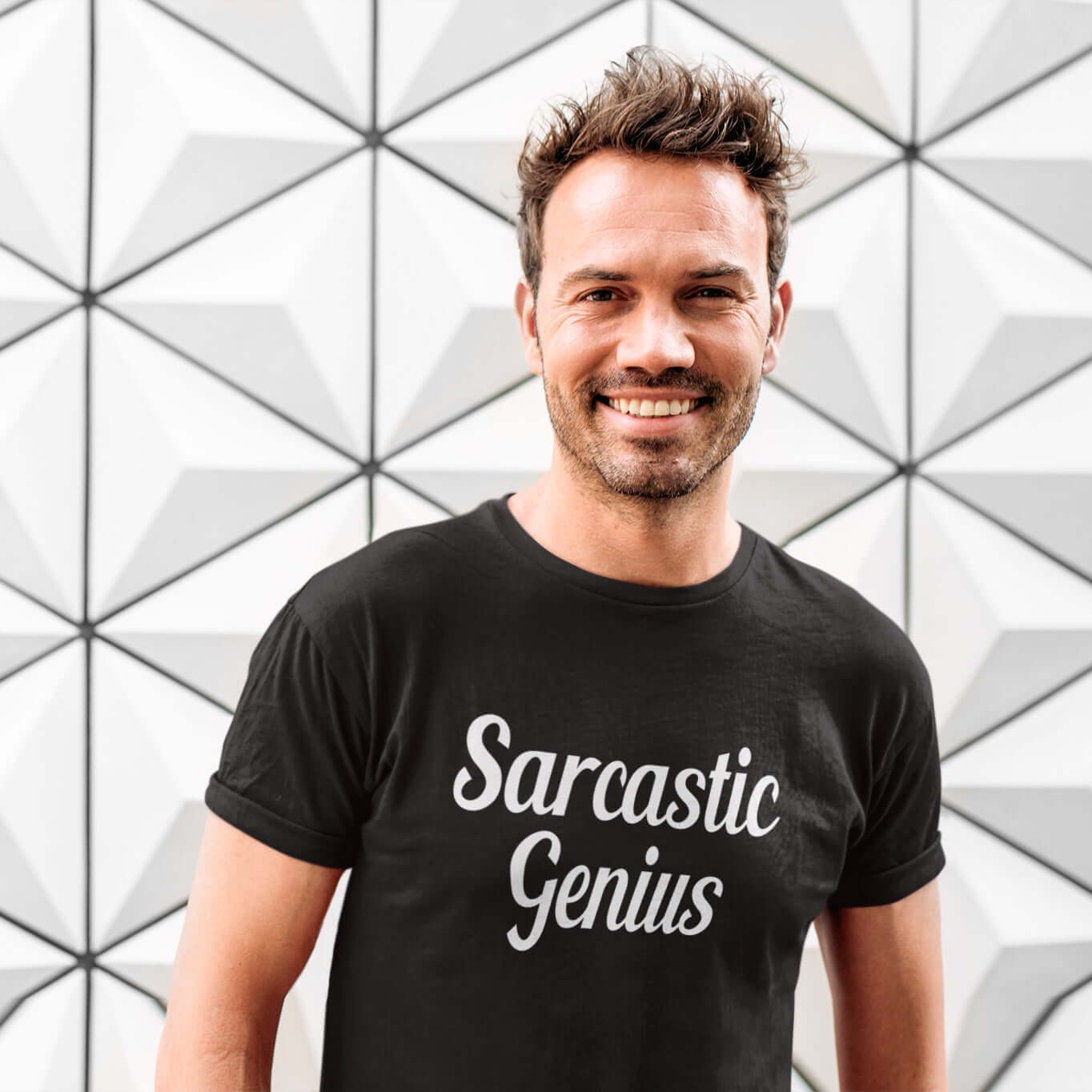 Man wearing a black t-shirt with the words Sarcastic Genius printed on the front.