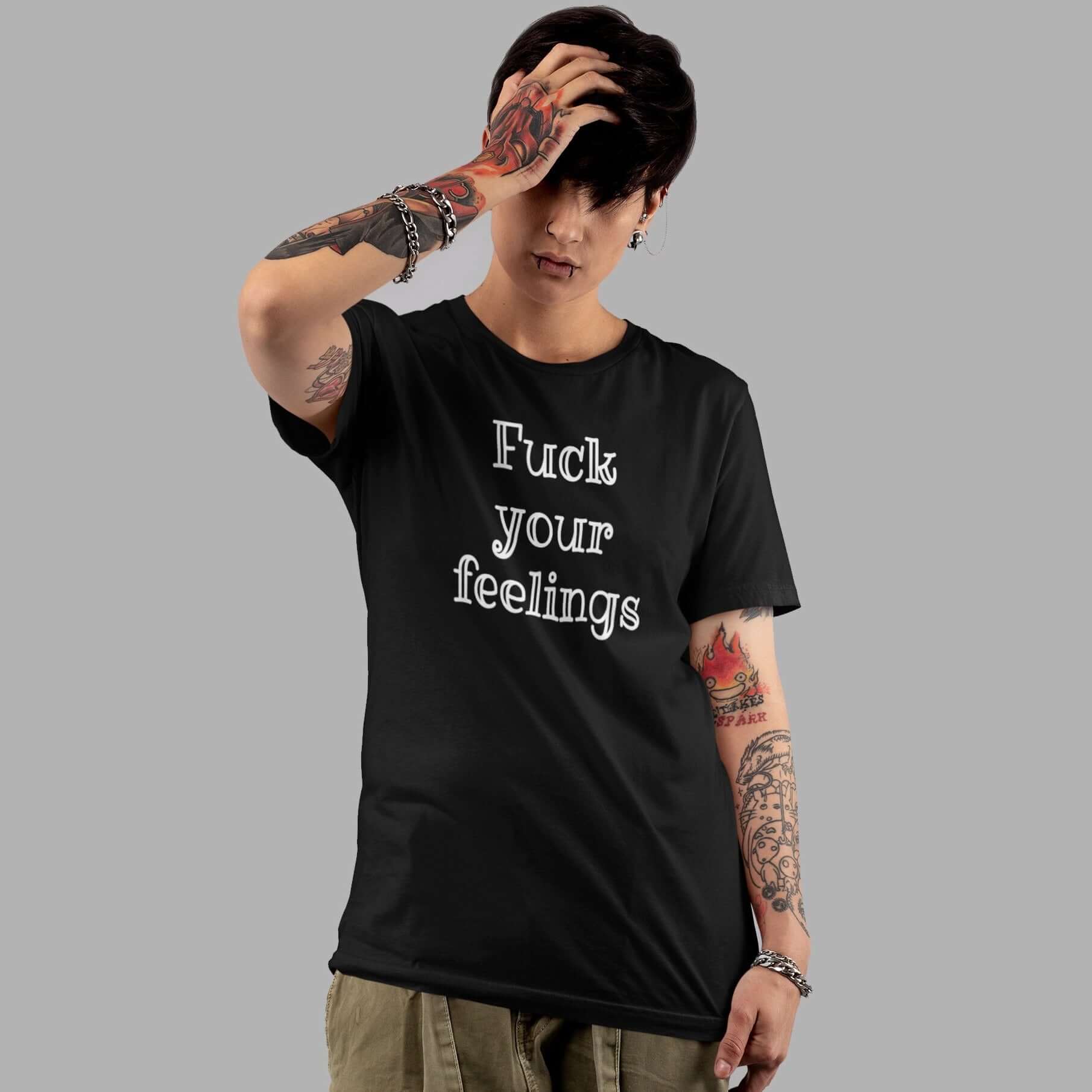 Edgy looking woman wearing black t-shirt with the words fuck your feelings printed on the front.