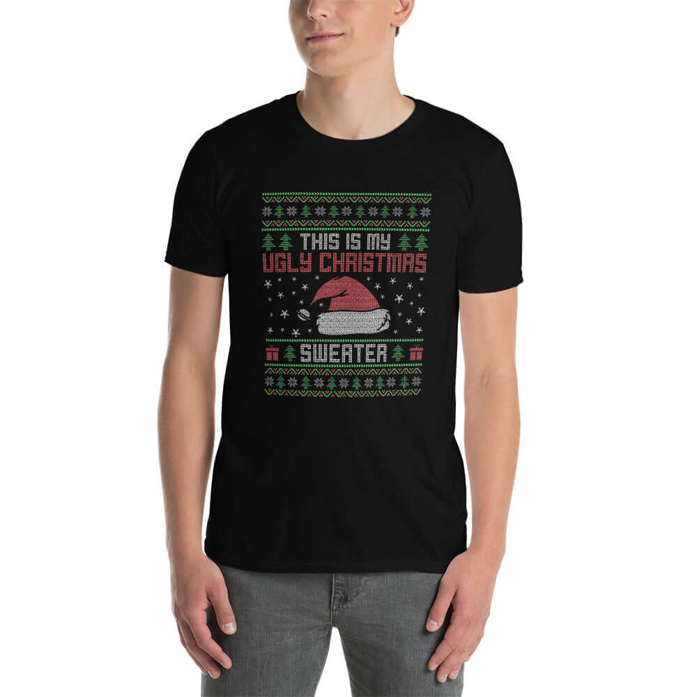 Man wearing black t-shirt with the words This is my ugly Christmas sweater printed on the front. 