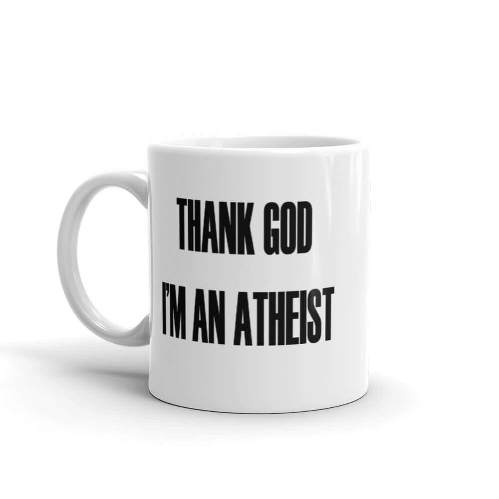 White ceramic mug with the words Thank God I'm an atheist printed on both sides.