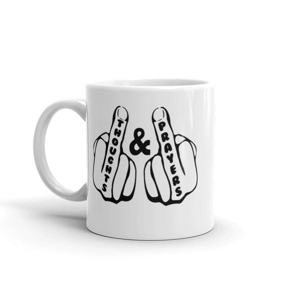 White ceramic coffee mug with an image of 2 line drawing hands with the middle fingers up. The word Thoughts is printed on one middle finger and the word Prayers is printed on the other middle finger. The graphics are printed on both sides of the mug.