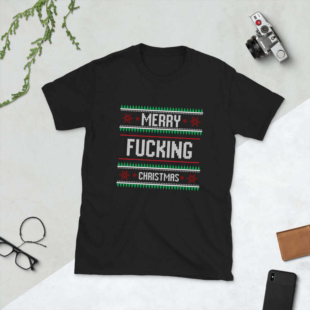 Black t-shirt with the phrase Merry fucking Christmas printed on the front in sweater print font.