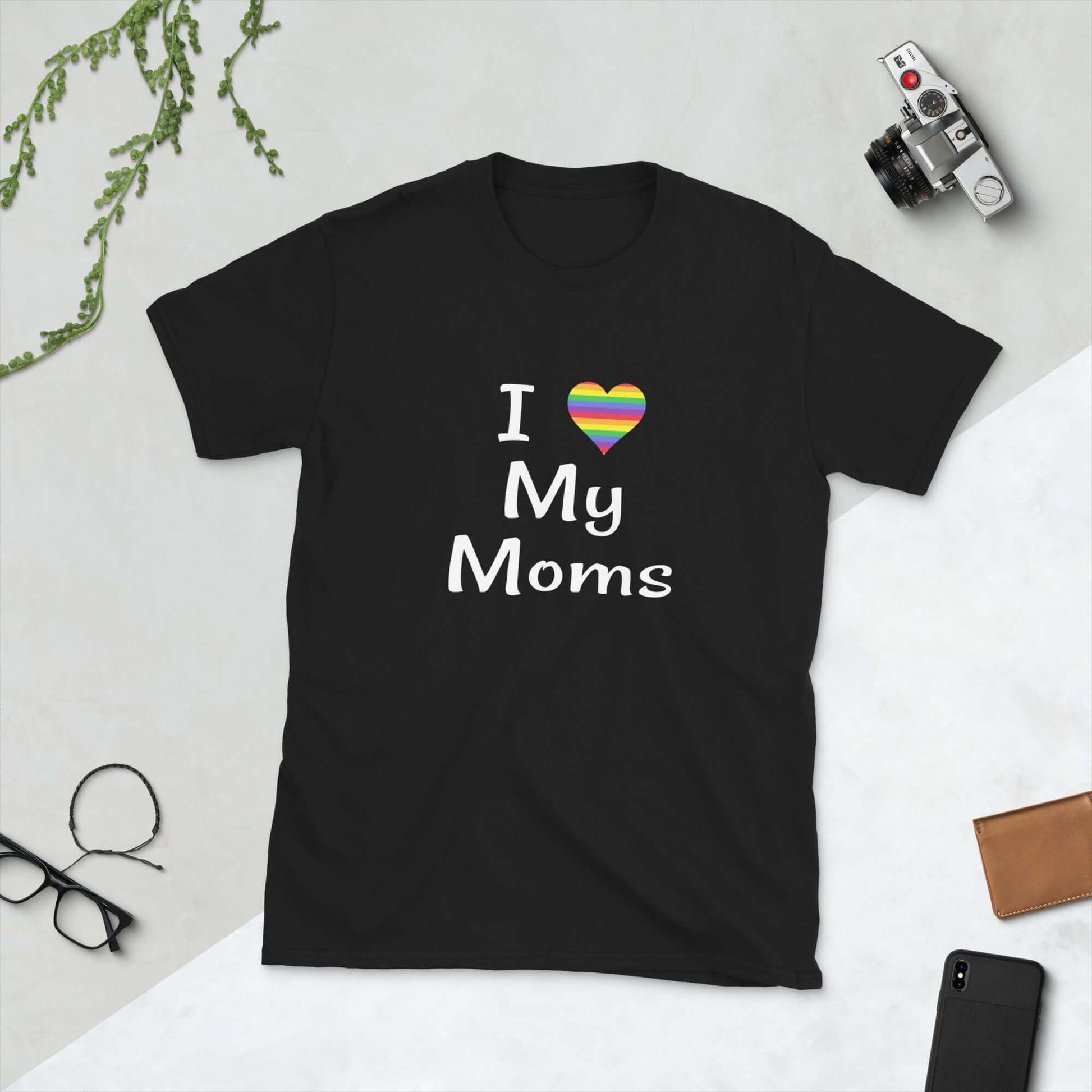 Black t-shirt with I heart my moms printed on the front. The heart is rainbow colors.