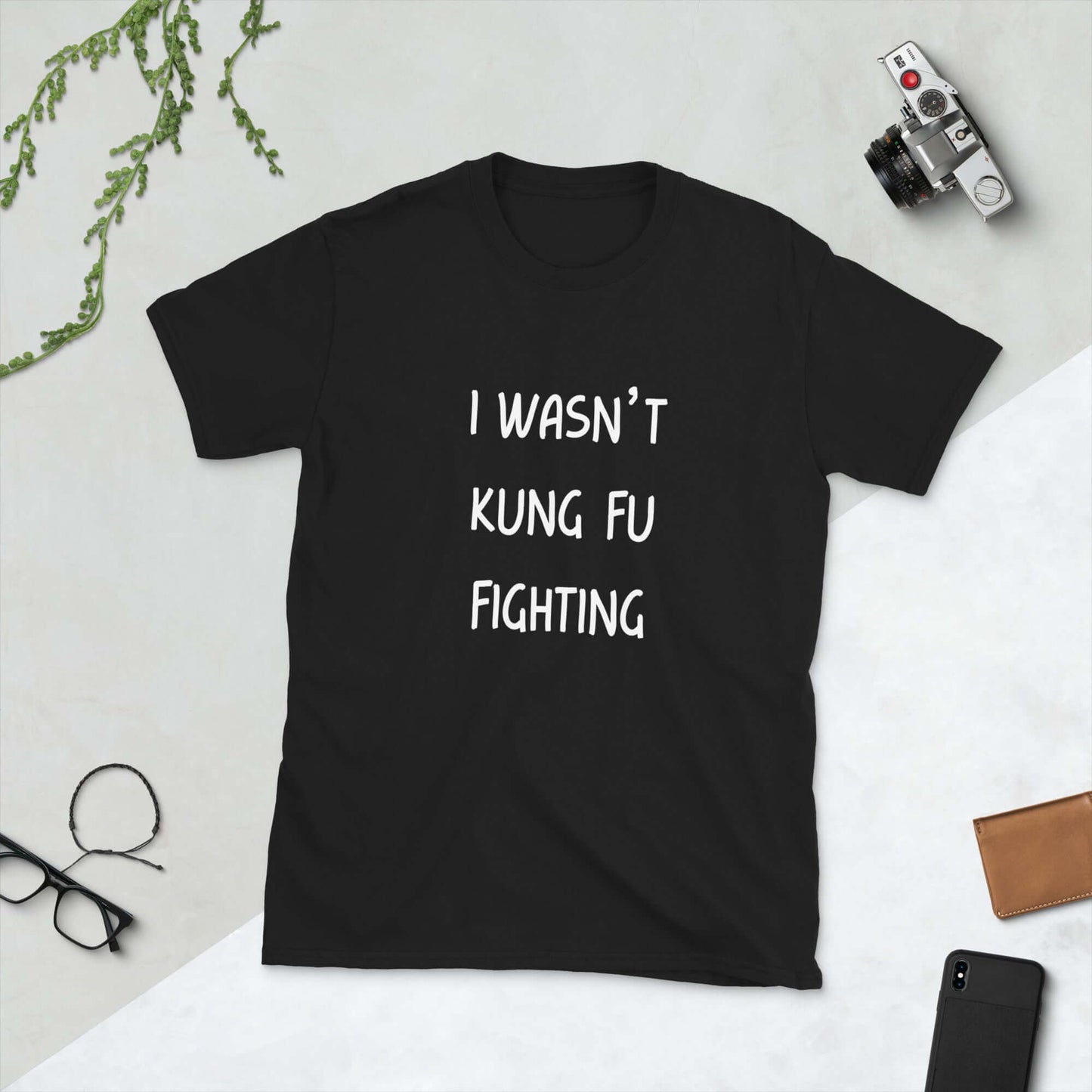 Black t-shirt with the funny phrase I wasn't kung fu fighting printed on the front.