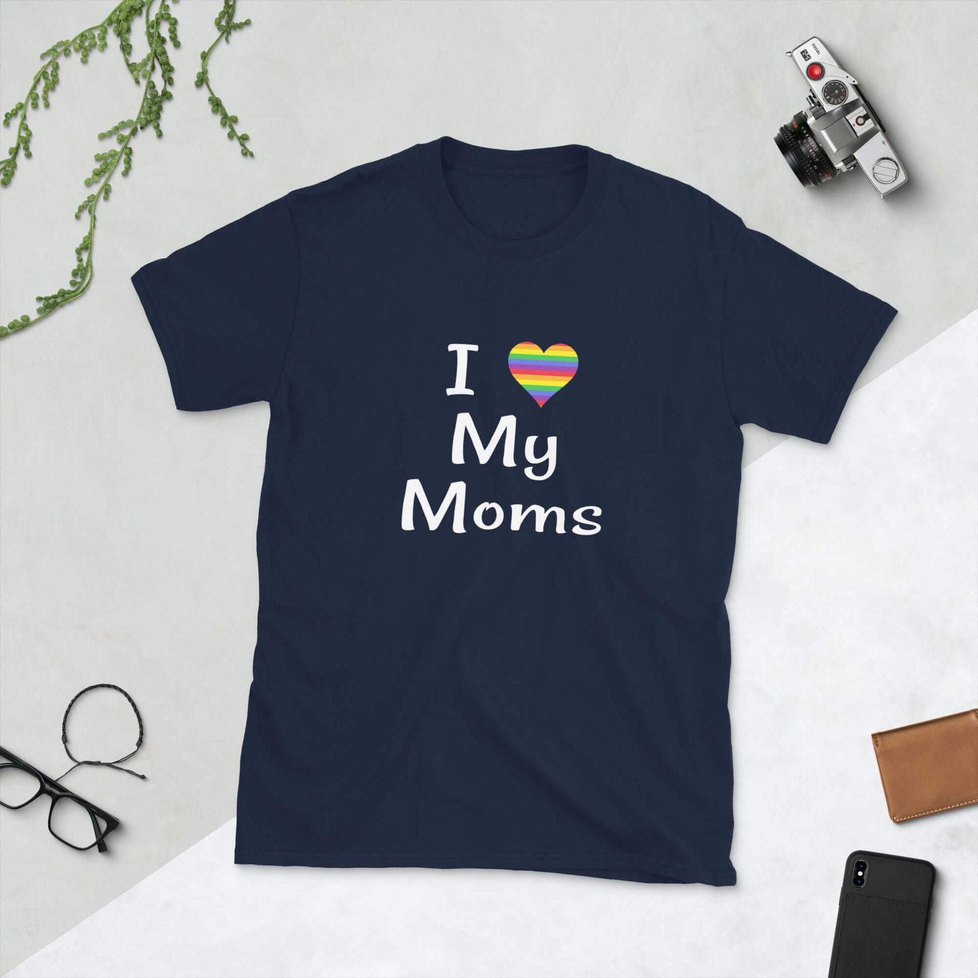 Navy blue t-shirt with I heart my moms printed on the front. The heart is rainbow colors.