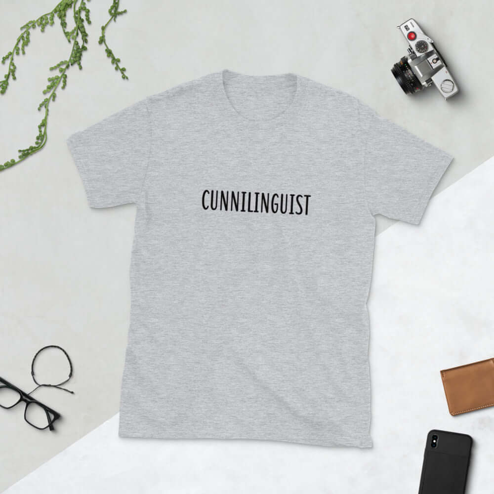 Light grey t-shirt with the word Cunnilinguist printed on the front.