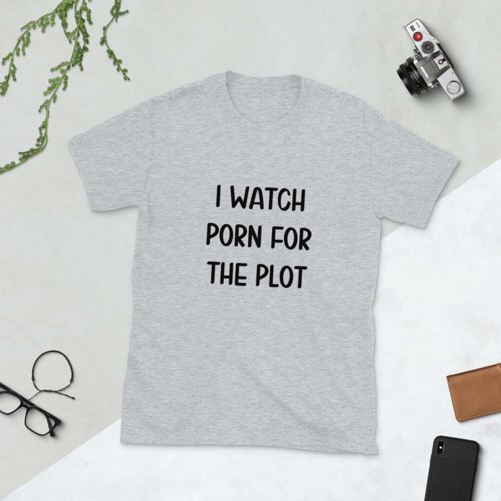Sport grey t-shirt with the words I watch porn for the plot printed on the front.