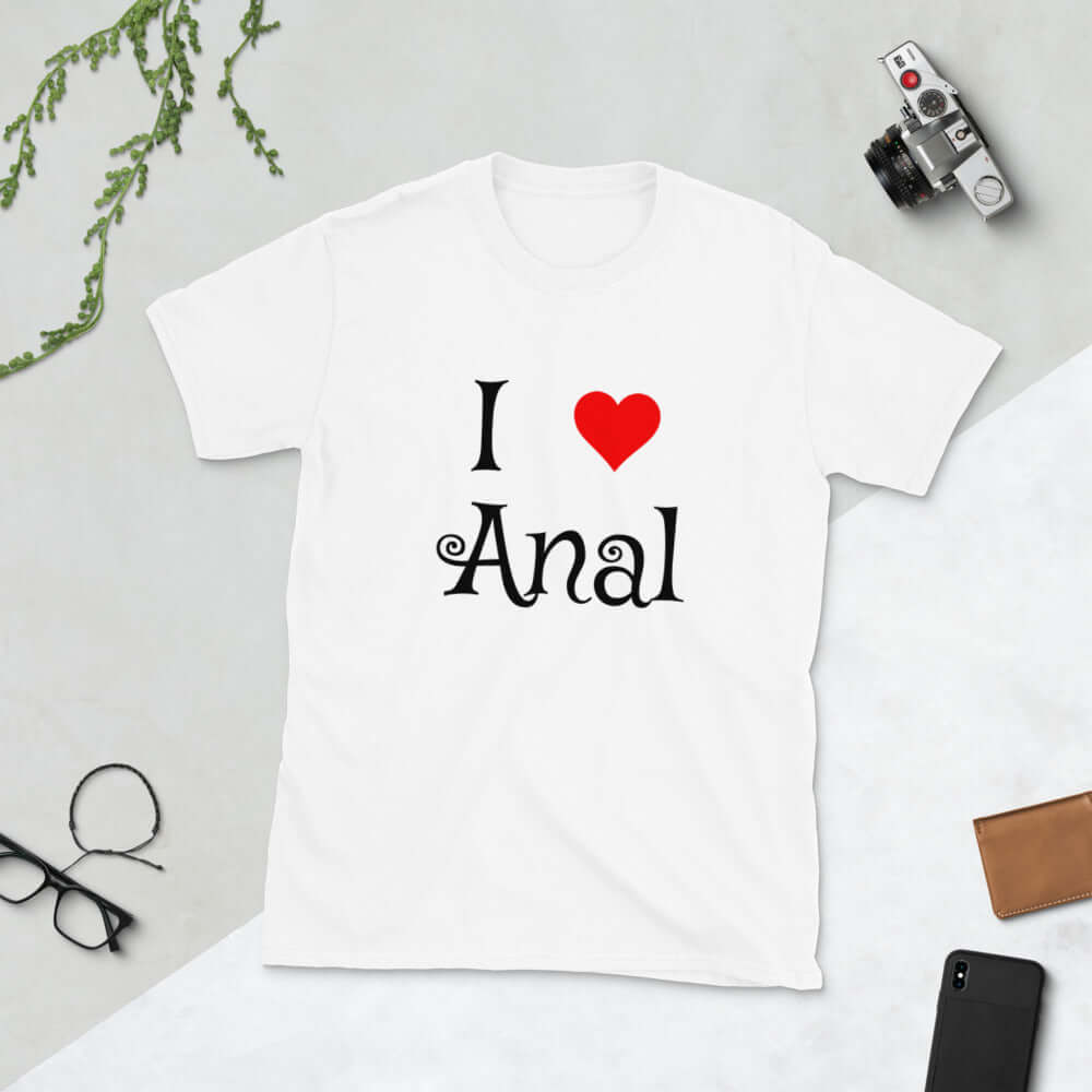 White t-shirt with the words I heart anal printed on the front. The heart is red.