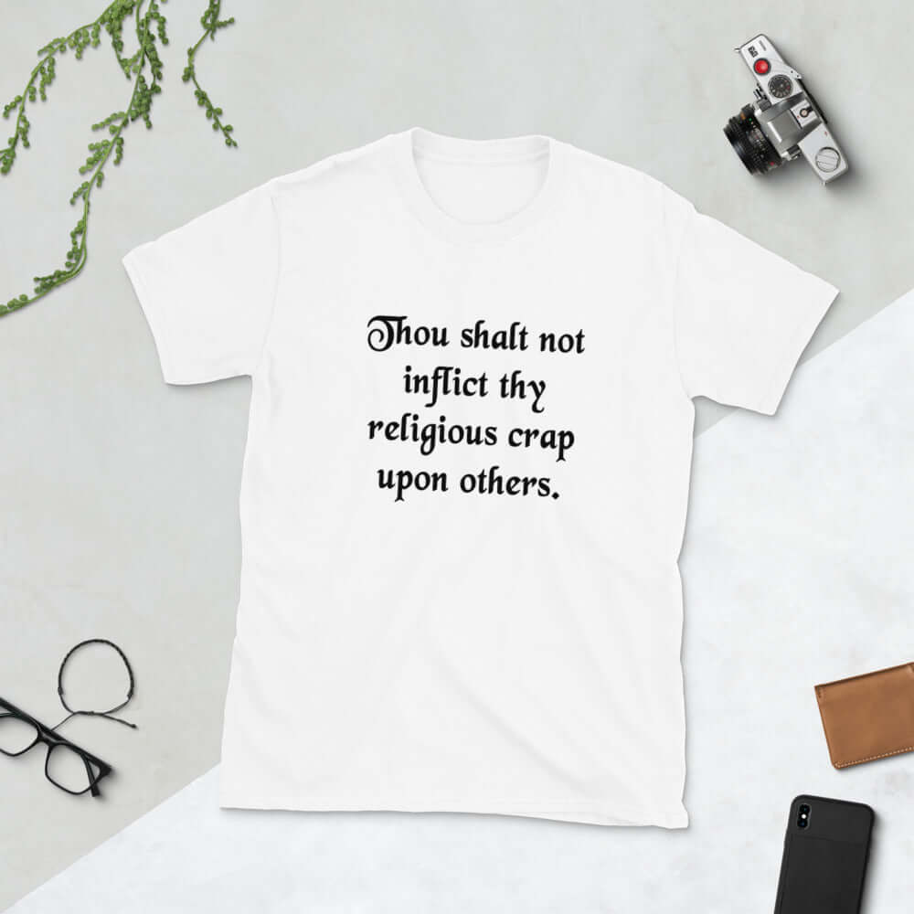 White t-shirt with the phrase Thou shalt not inflict thy religious crap upon others printed on the front.