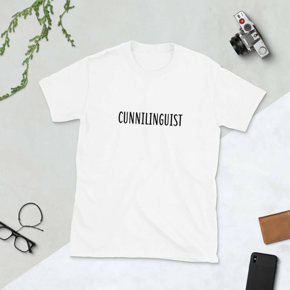 White t-shirt with the word Cunnilinguist printed on the front.