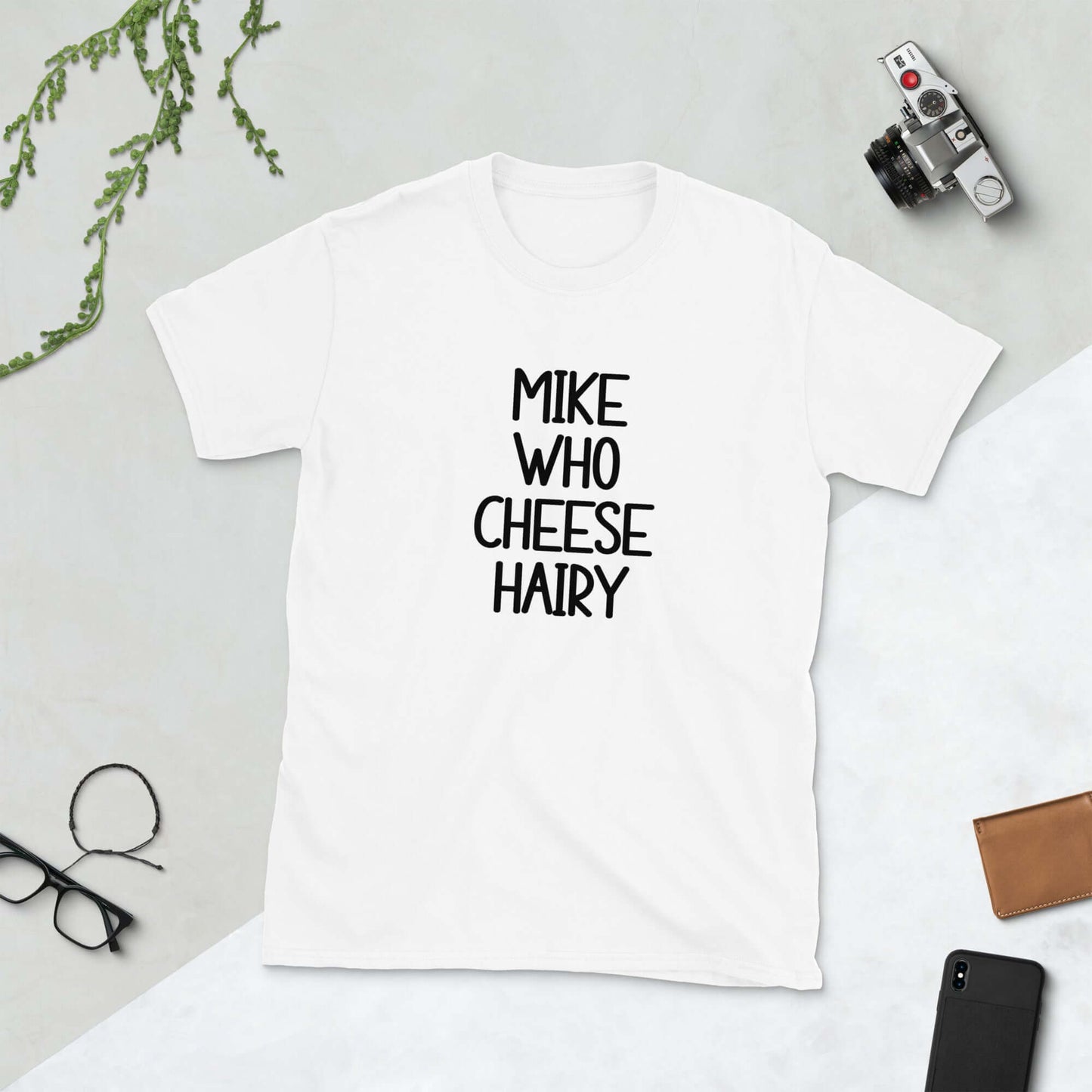 White pun t-shirt with the words Mike who cheese hairy printed on the front.