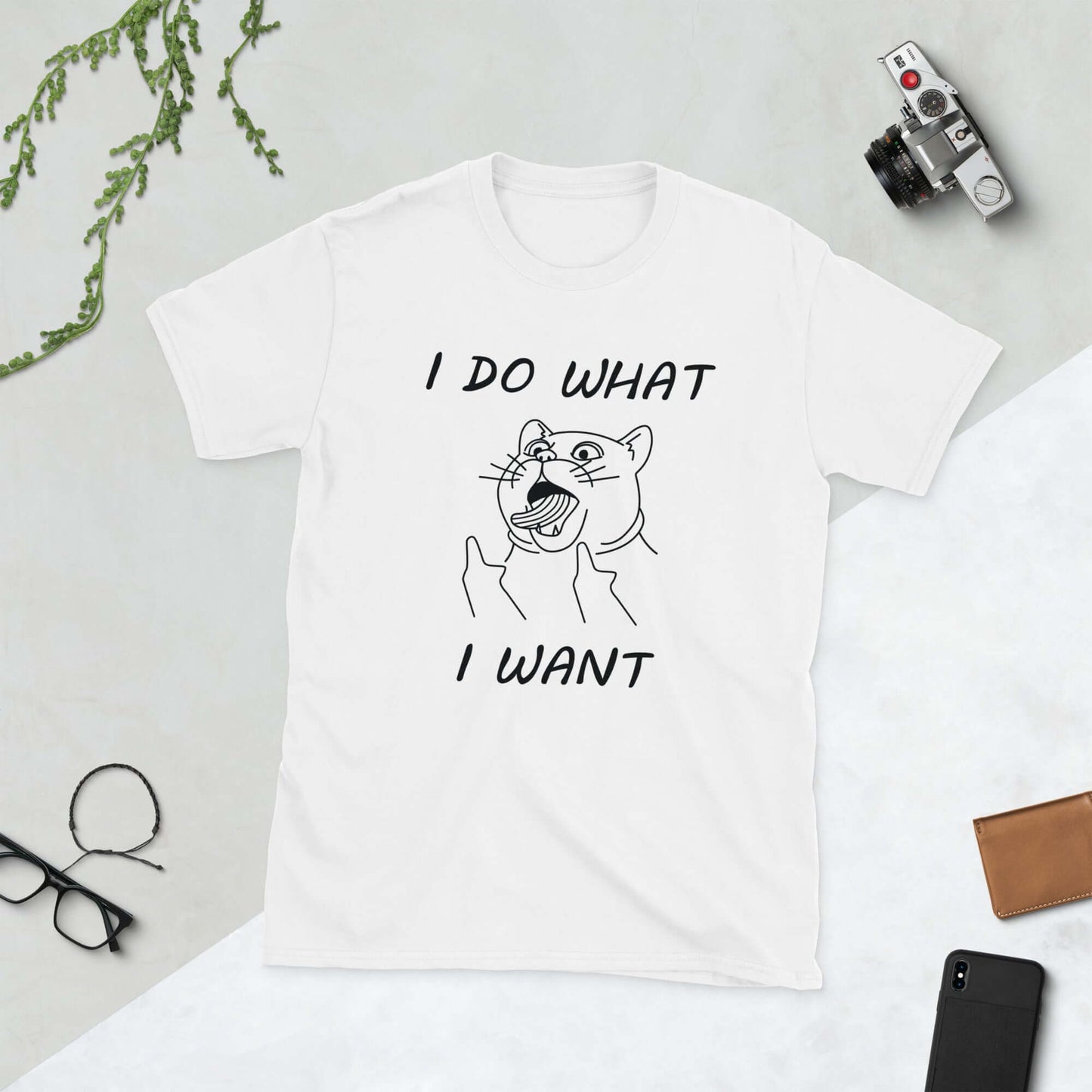 White t-shirt with cat flipping middle fingers and the words I do what I want printed on the front.