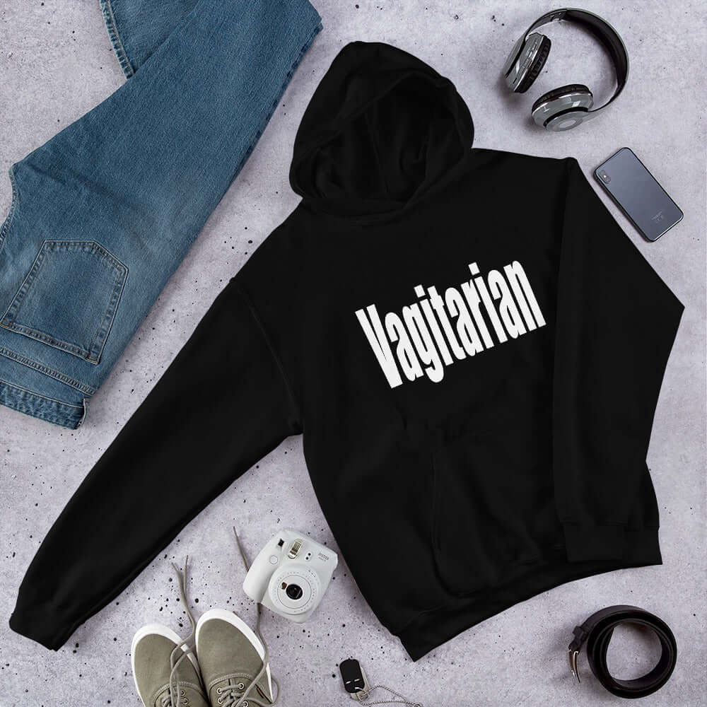 Black hoodie sweatshirt with the word Vagitarian printed on the front.