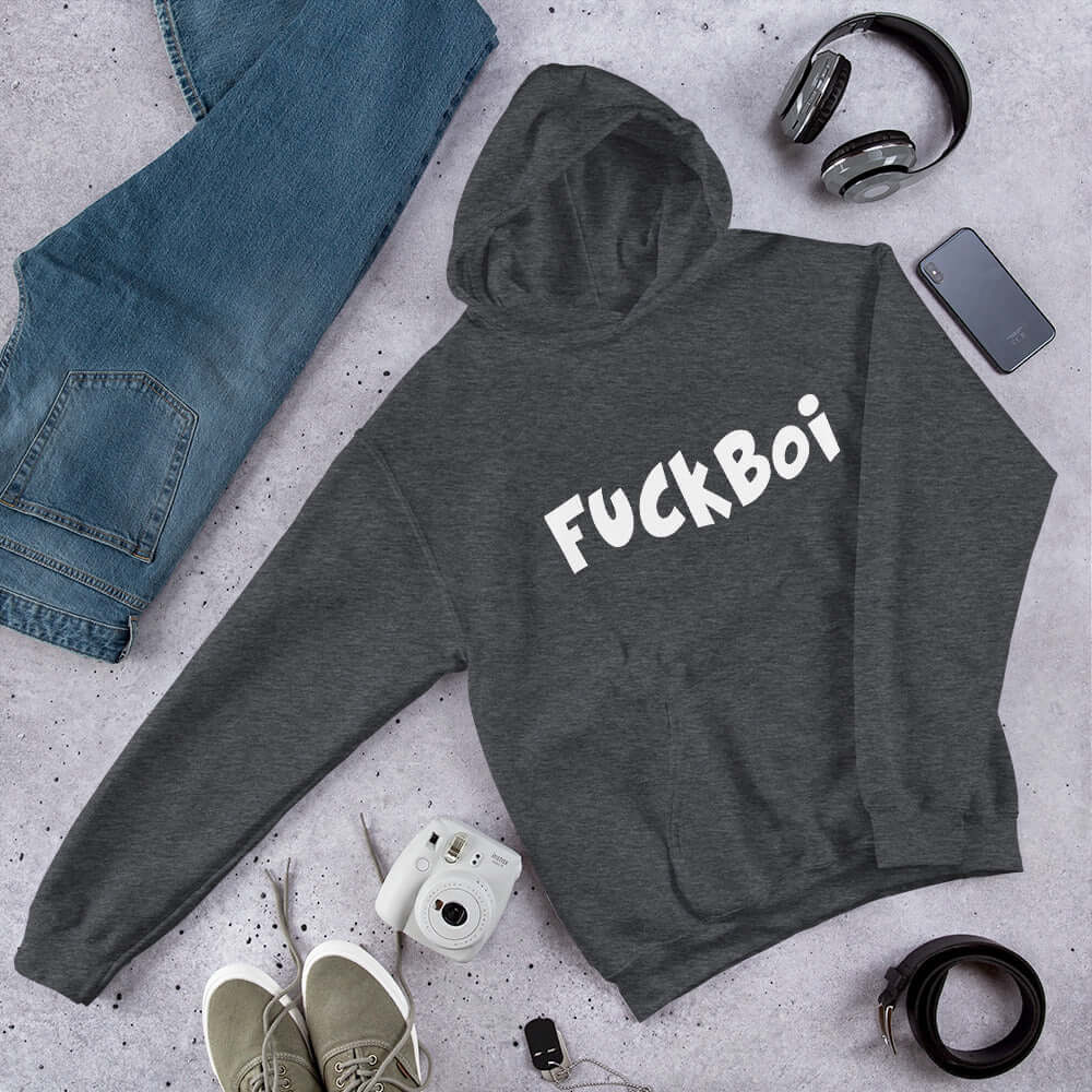Dark grey hoodie sweatshirt with the word Fuckboi printed on the front.