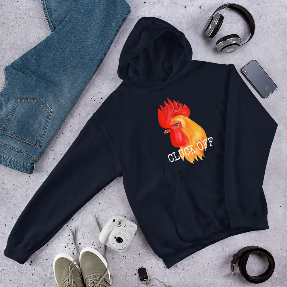 Navy blue pun hoodie sweatshirt that has graphic of a chicken and the words Cluck off printed on the front.