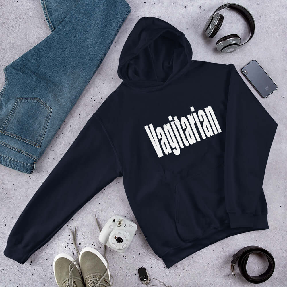 Navy blue hoodie sweatshirt with the word Vagitarian printed on the front.