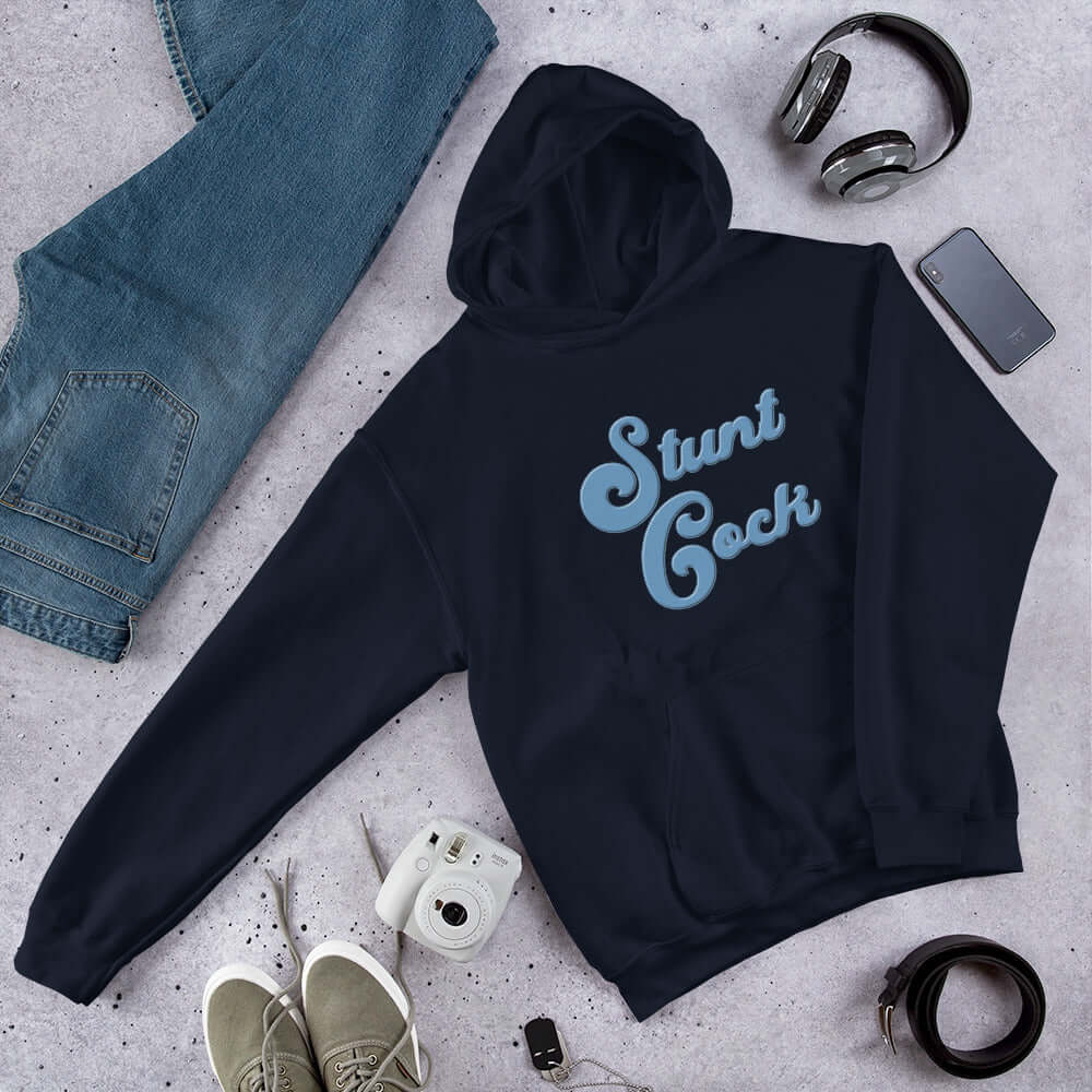 Navy blue hooded sweatshirt with the words Stunt Cock printed on the front in blue.