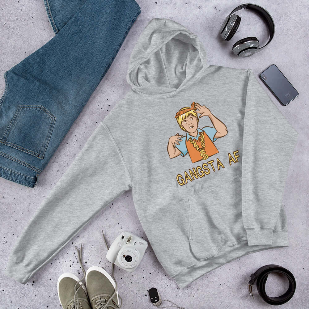 Light grey hoodie sweatshirt with a parody image of a blond haired child trying to be a gangster with the words Gangsta AF printed on the front.