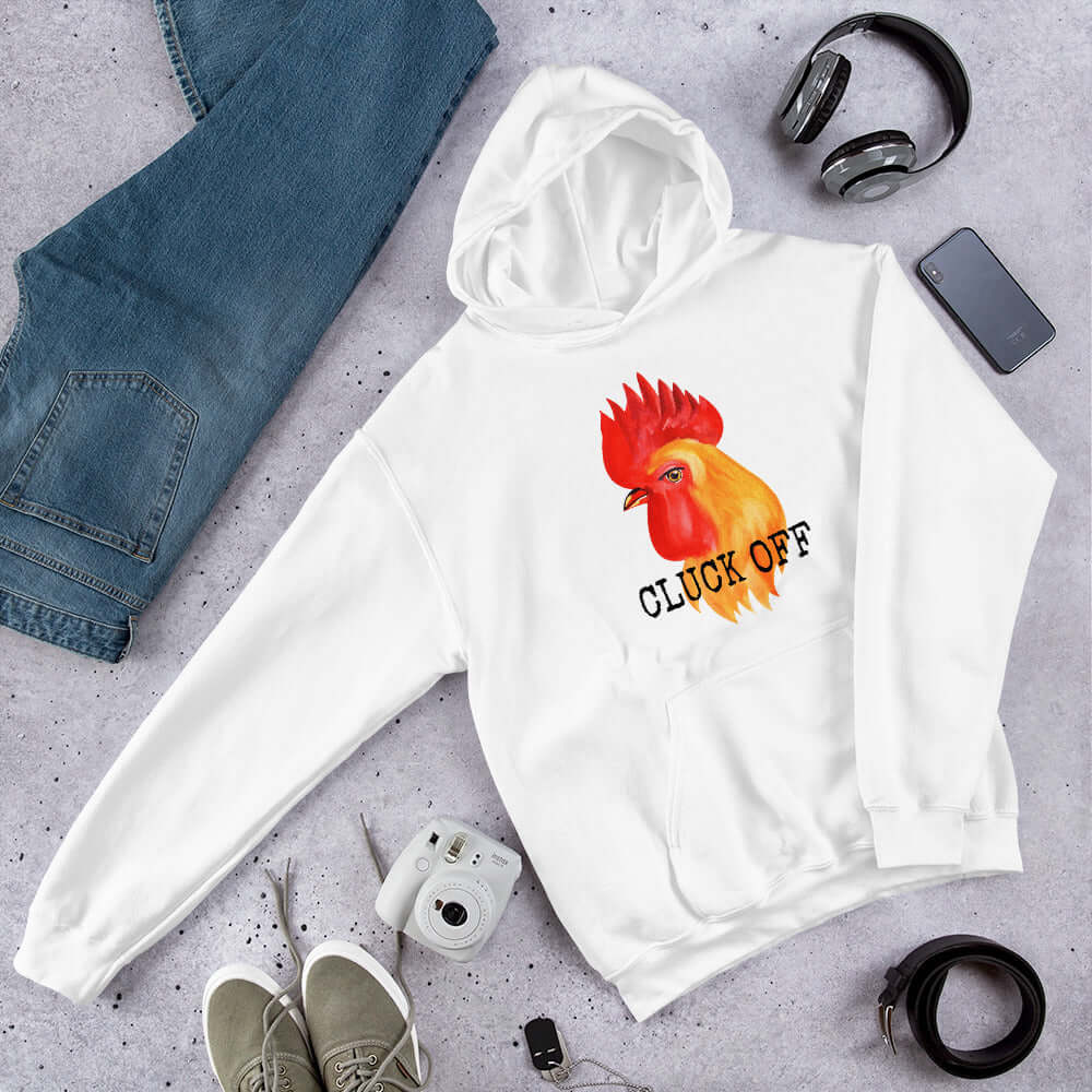 White pun hoodie sweatshirt that has graphic of a chicken and the words Cluck off printed on the front.