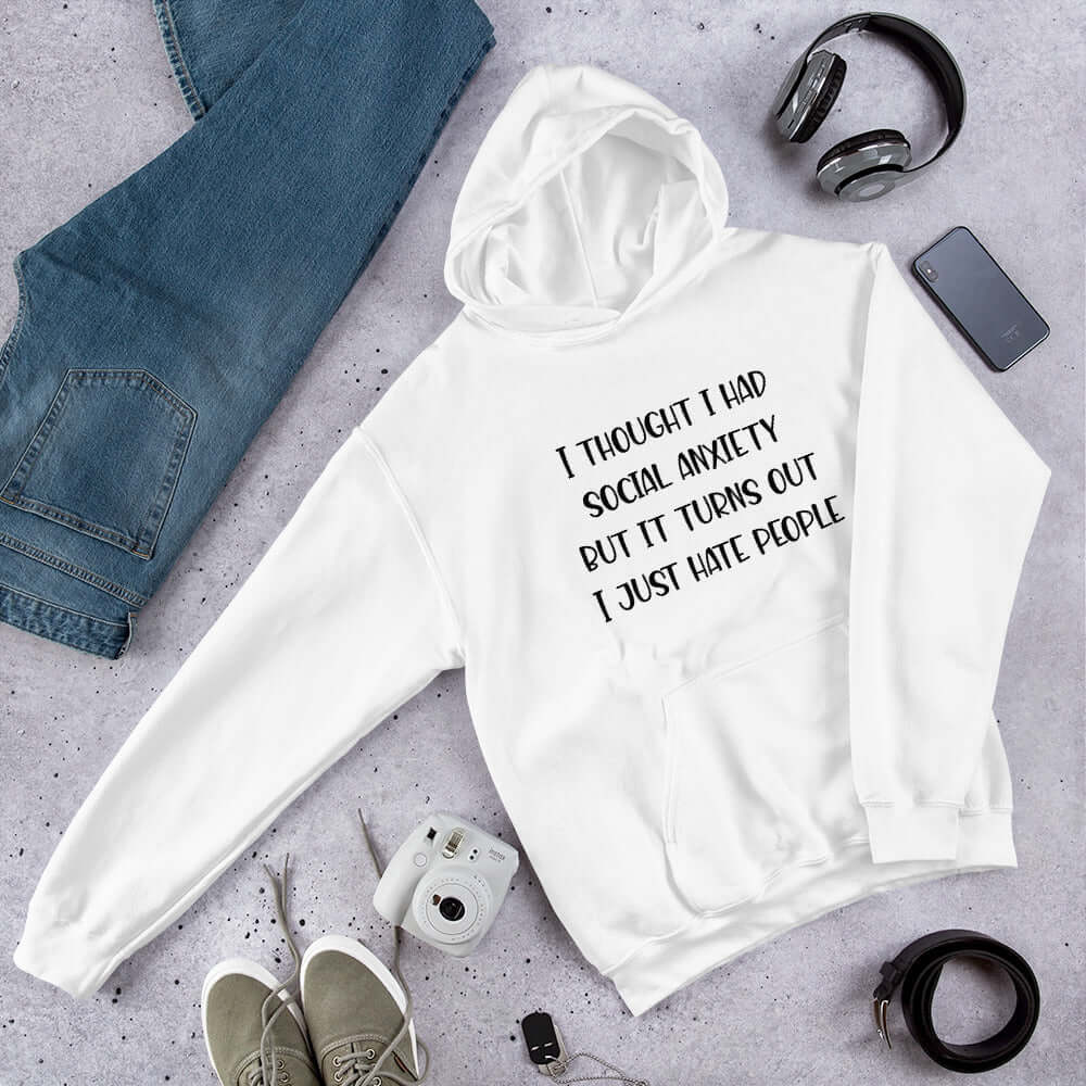 White hoodie sweatshirt with the phrase I thought I had social anxiety but it turns out I just hate people printed on the front.