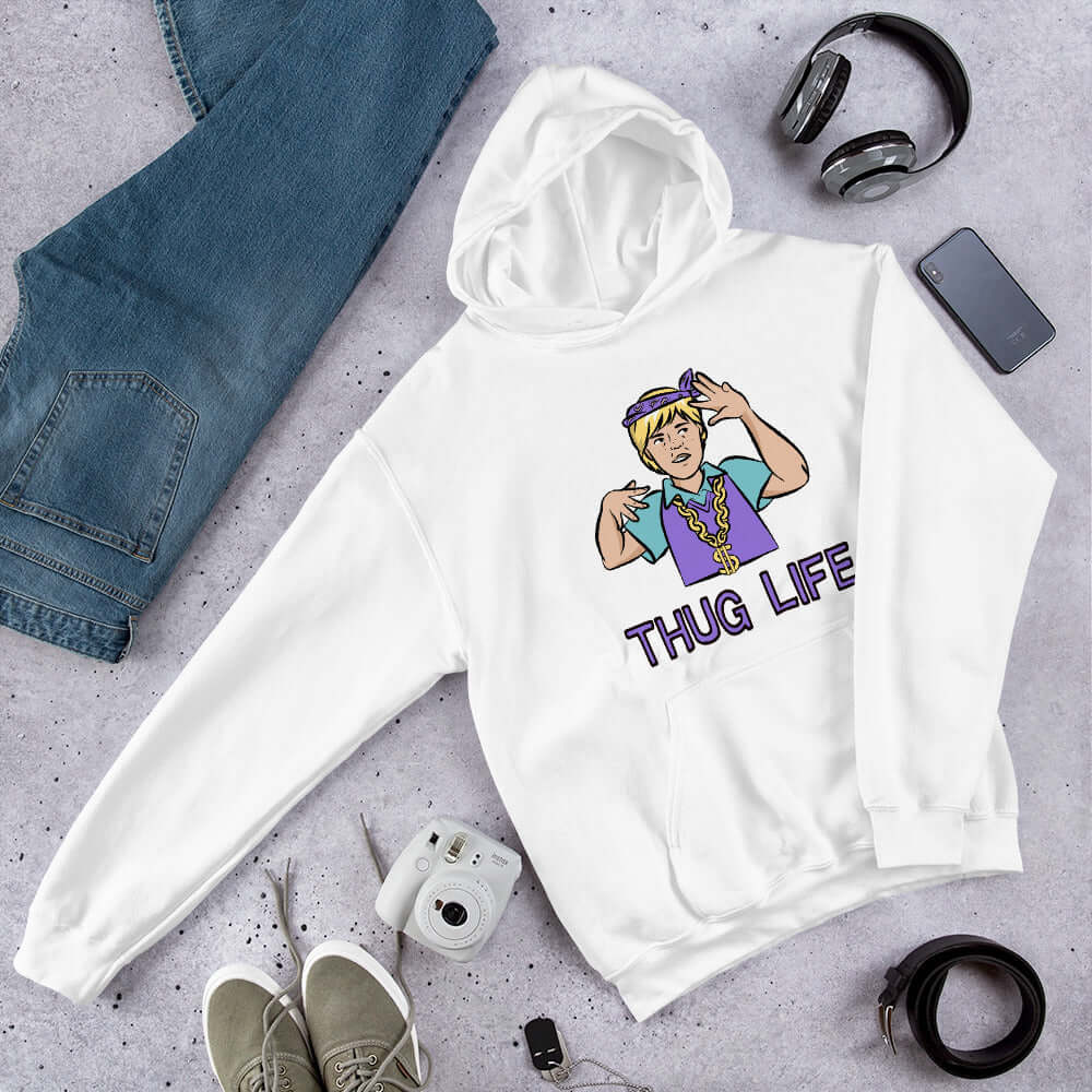 White hoodie sweatshirt with a parody image of a blond haired child trying to be a gangster with the words Thug Life printed on the front.