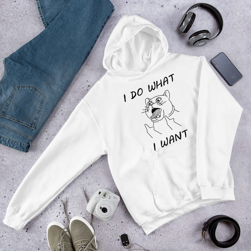 White hooded sweatshirt with cat flipping middle fingers and the words I do what I want printed on the front.