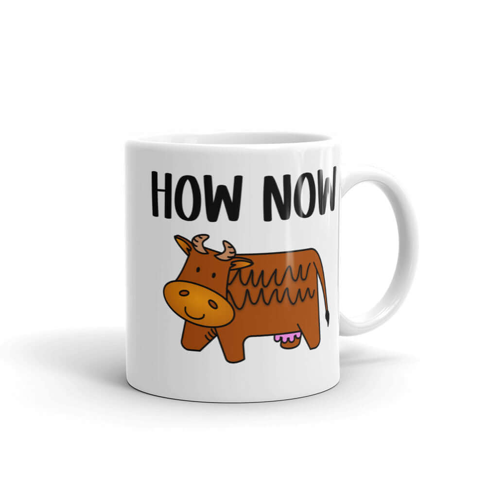 White ceramic mug with the words How now and an image of a brown cow printed on both sides.