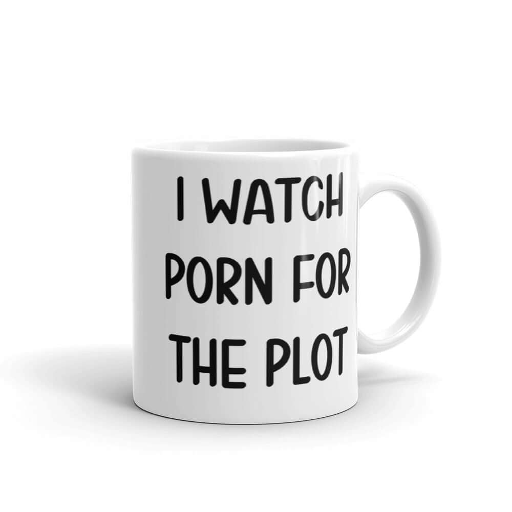 White ceramic coffee mug with the words I watch porn for the plot printed on both sides.