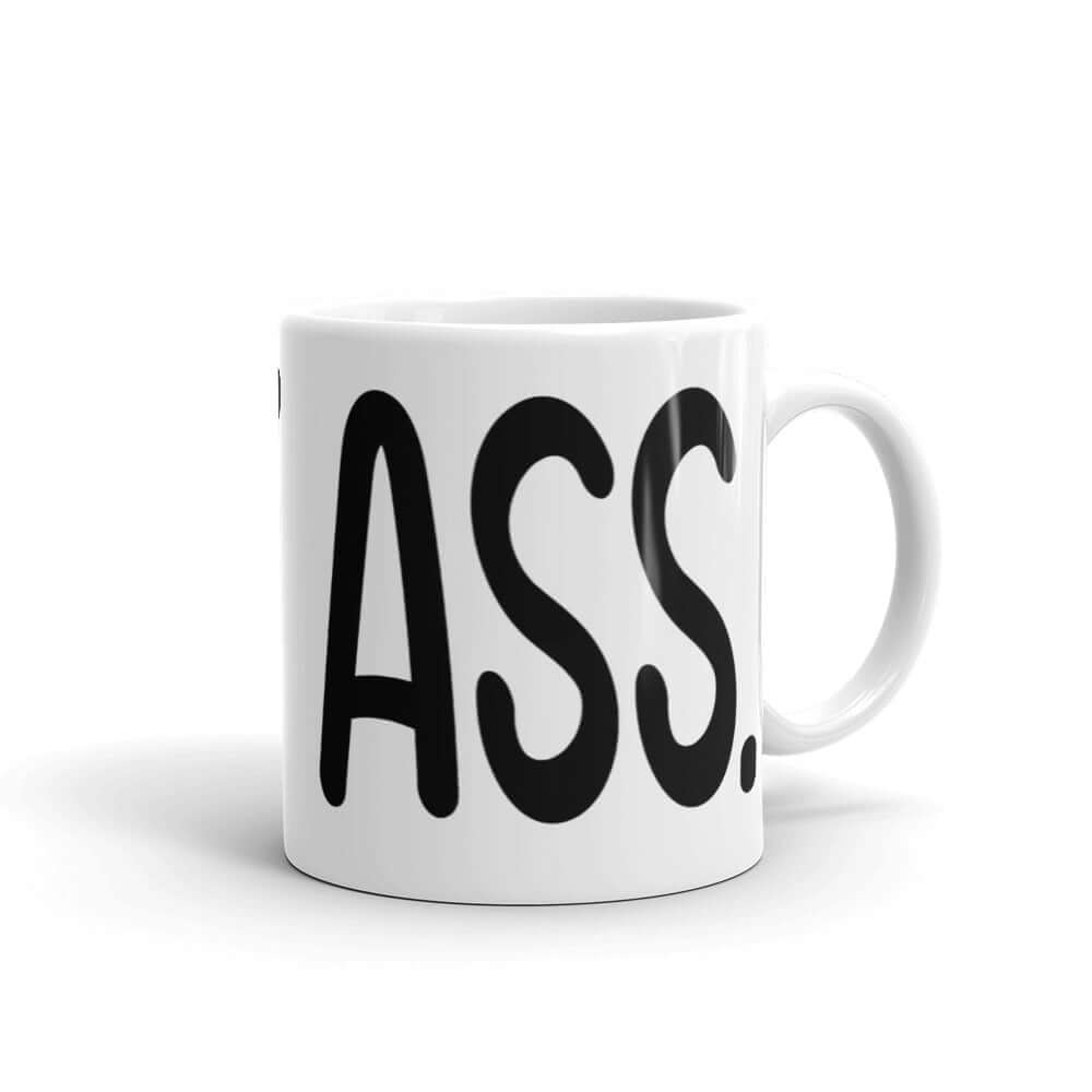 White ceramic coffee mug with the words I eat ass printed on it. The words are large and wrap all around the mug.