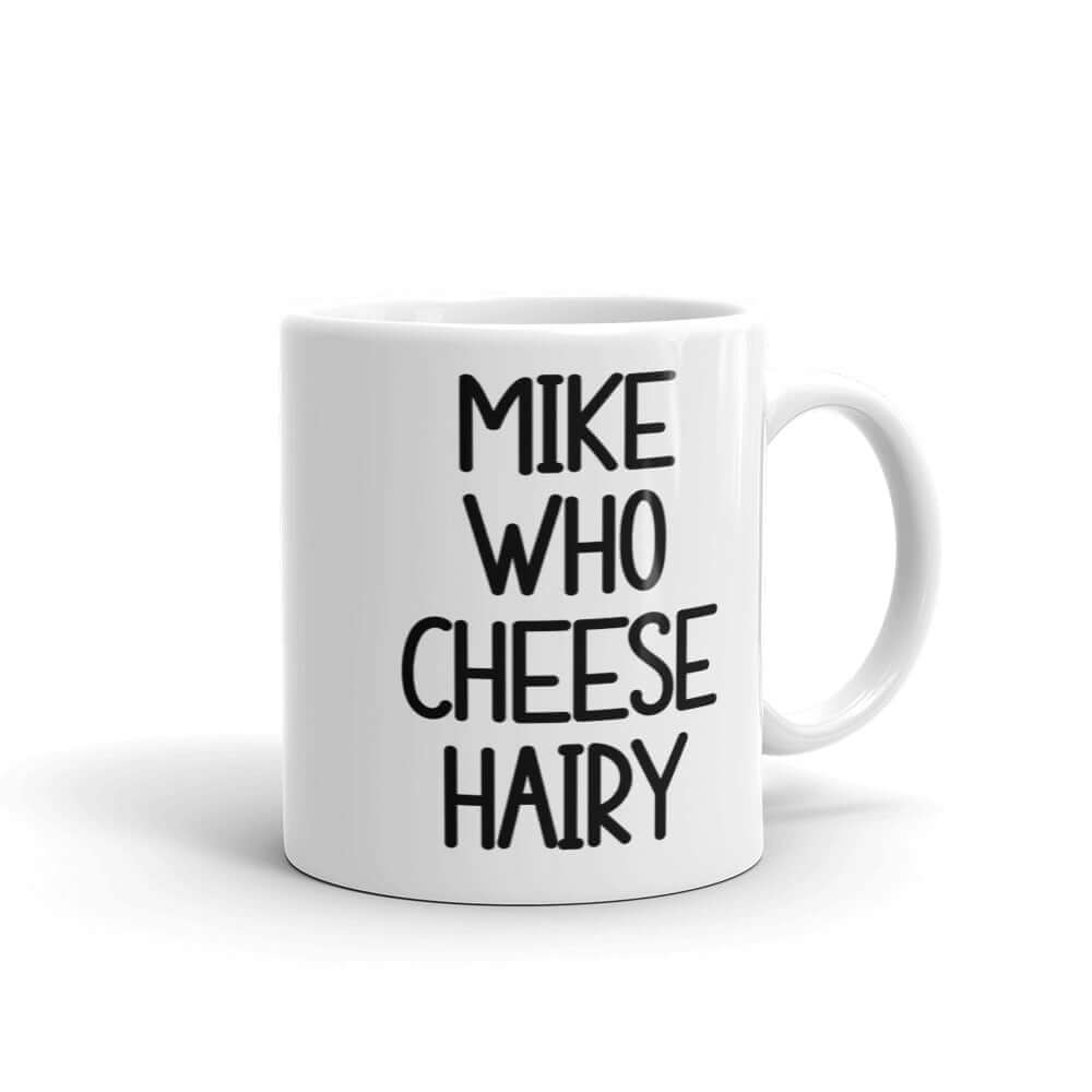 White ceramic pun mug with the words Mike who cheese hairy printed on both sides.