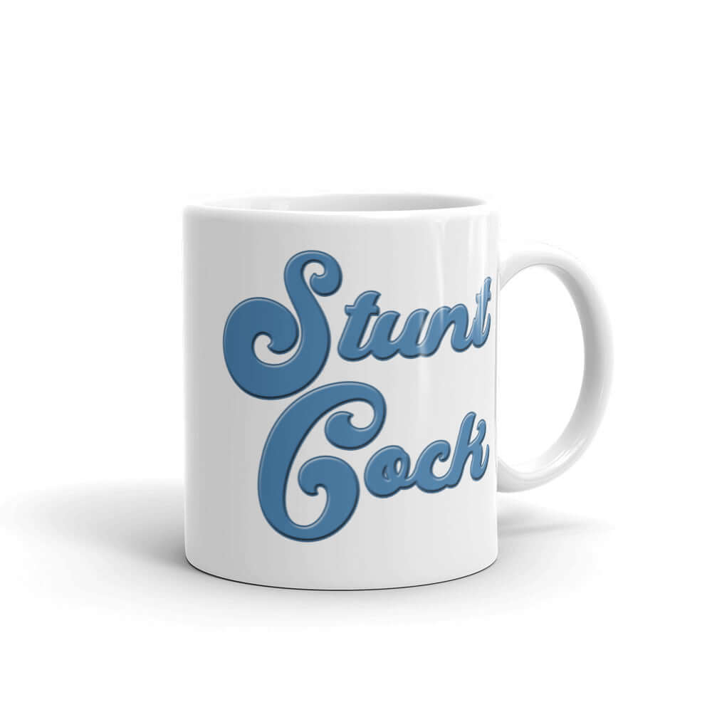 White ceramic mug with the words Stunt Cock printed on both sides in blue.