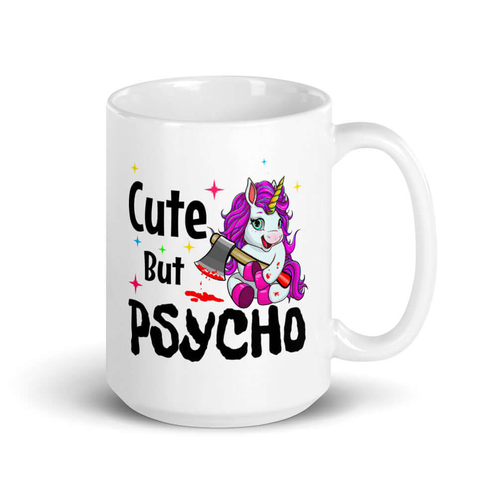 White ceramic coffee mug that has a graphic of a unicorn holding a knife & the words Cute but psycho printed on both sides.