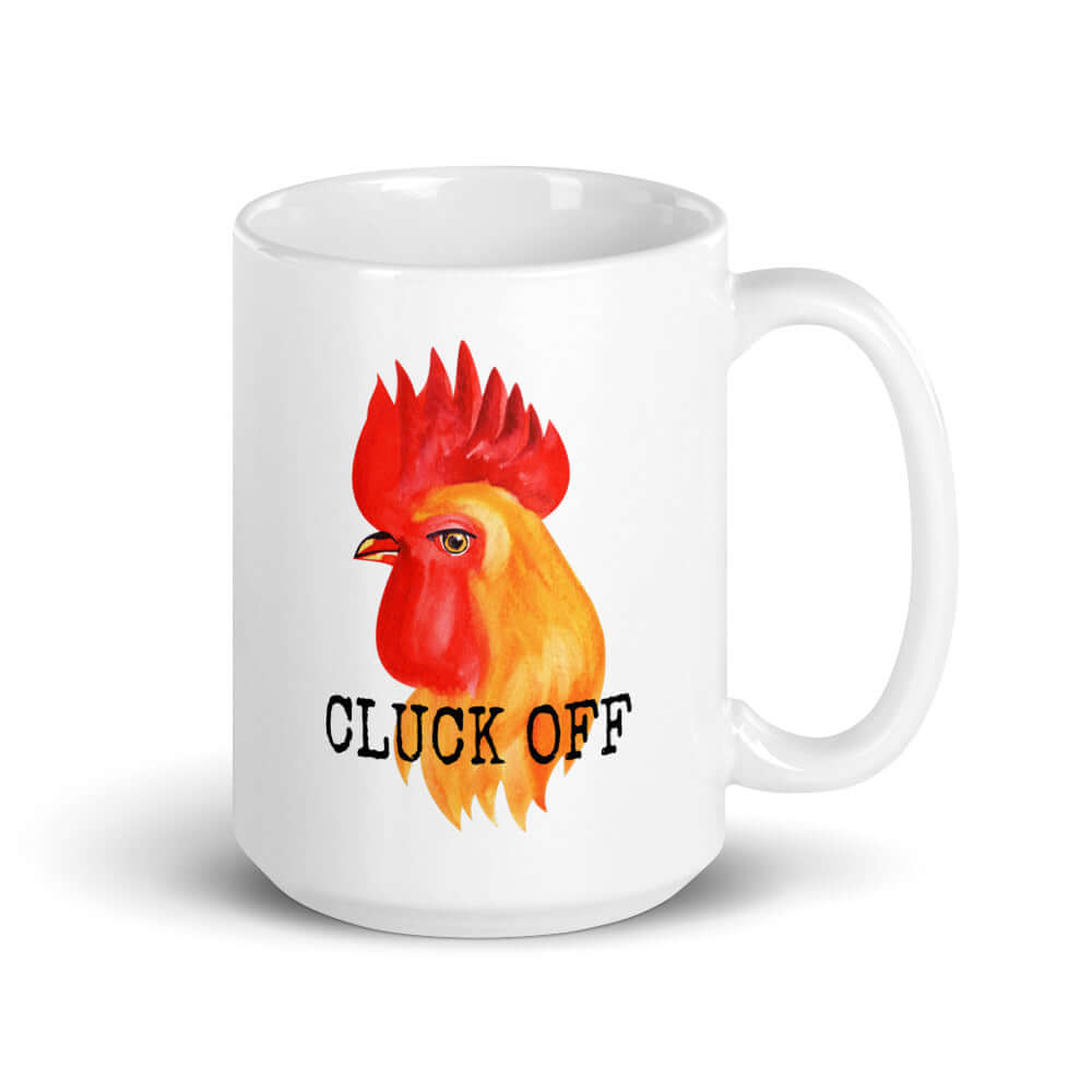 White ceramic mug pun that has graphic of a chicken and the words Cluck off printed on both sides.