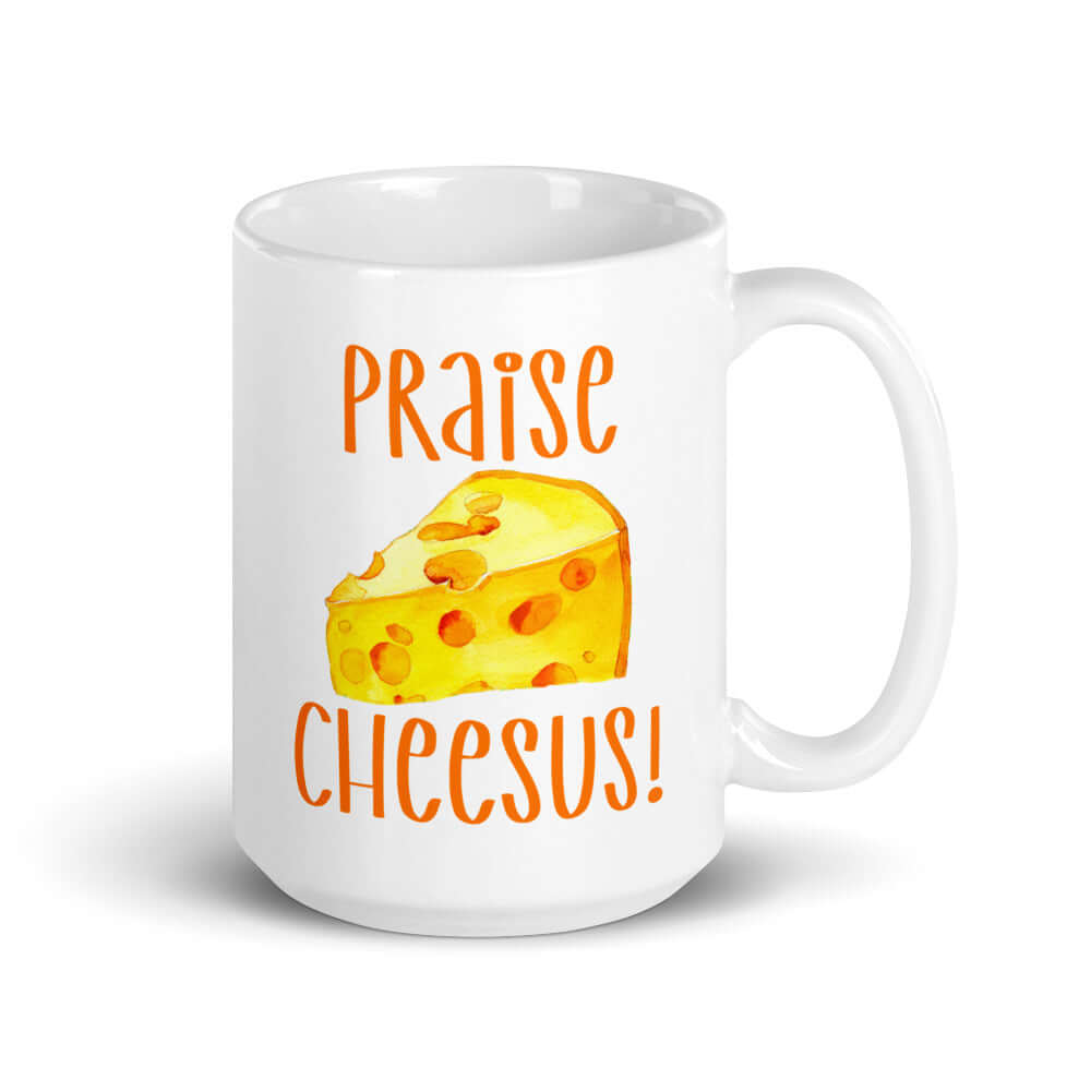 White ceramic coffee mug with funny graphics of a piece of swiss cheese and the words Praise Cheesus printed on both sides of the mug in yellow and orange.