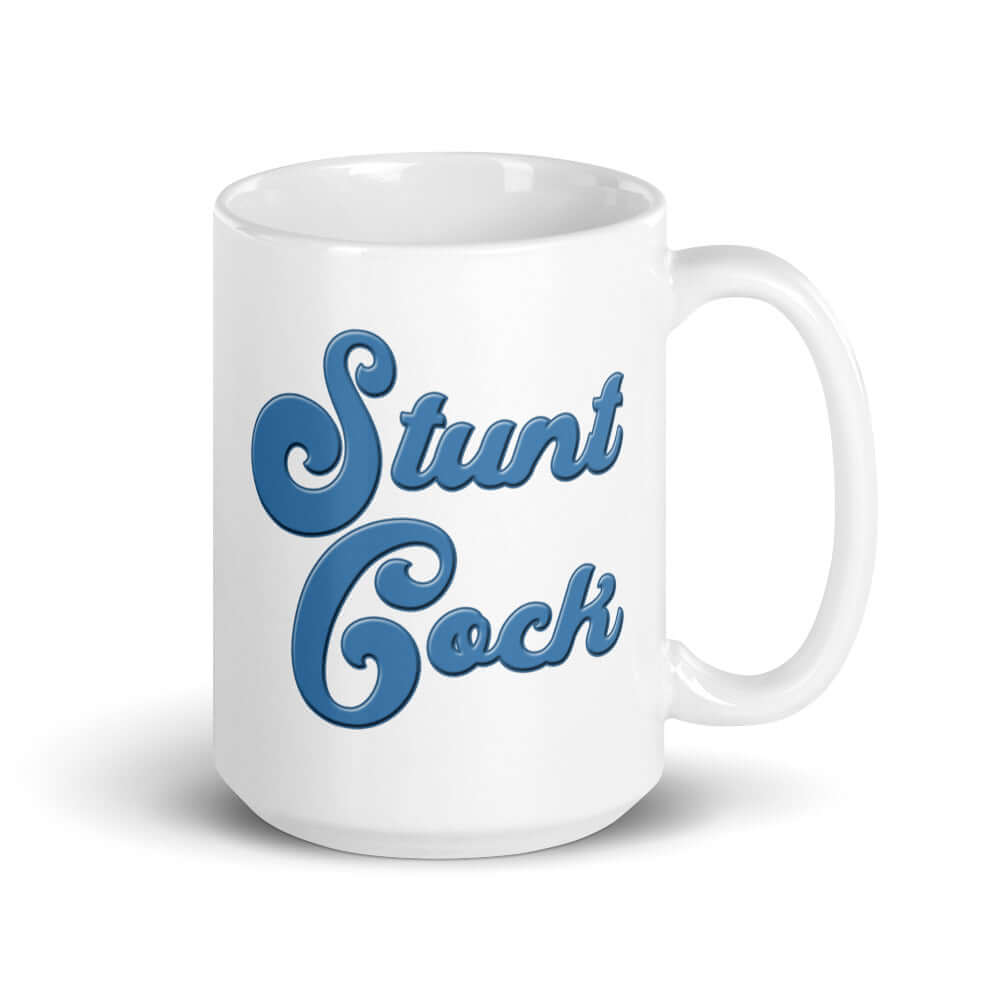 White ceramic mug with the words Stunt Cock printed on both sides in blue.