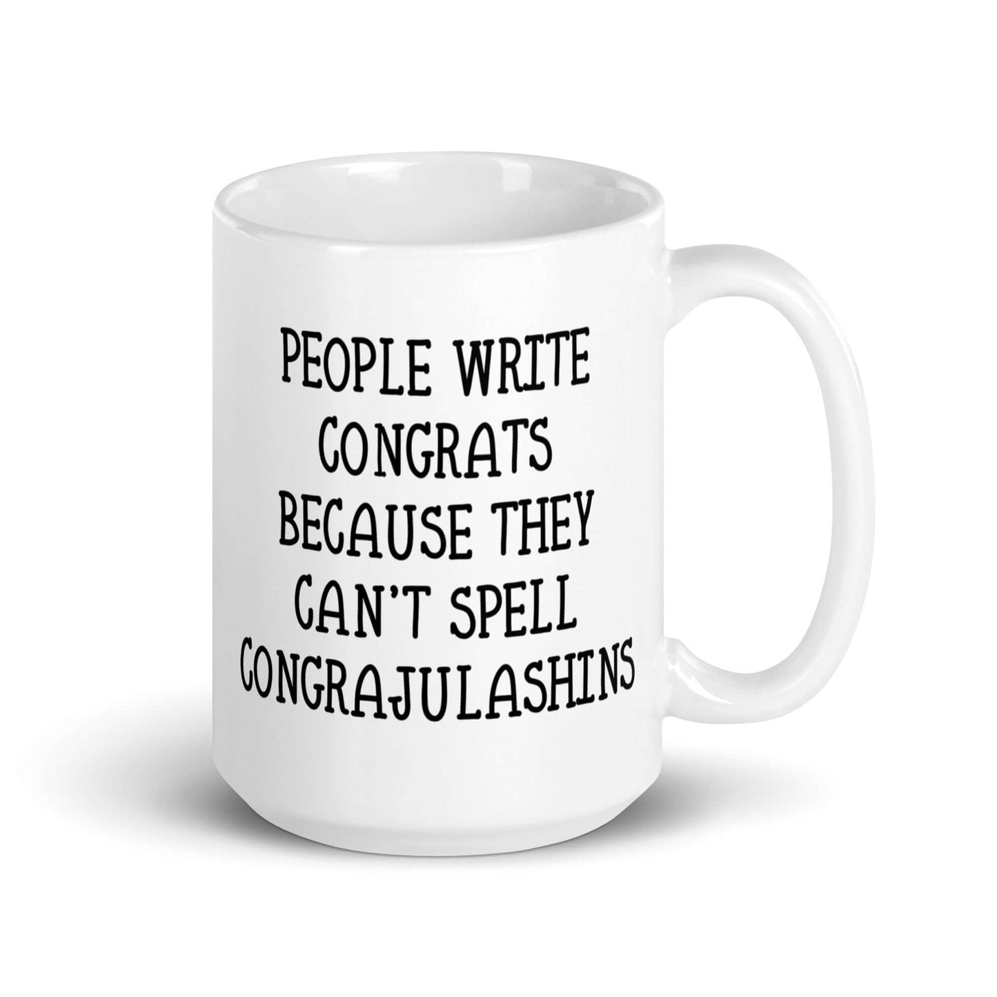 White ceramic mug with the words People write congrats because they can't spell congratulations printed on both sides. The word congratulations is intentionally misspelled.