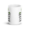 White ceramic mug with image of an alien and the words 'Being abducted by aliens might just be the vacation I need right now' printed on both sides.