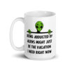 White ceramic mug with image of an alien and the words 'Being abducted by aliens might just be the vacation I need right now' printed on both sides.