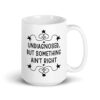 White ceramic mug with the text 'Undiagnosed, but something ain't right' printed on both sides.