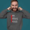Man wearing dark grey hoodie sweatshirt, The hoodie has an image of a big red pen and the words 'My pen is huge' printed on the front. The words Pen and is are close together so that at first glance it appears that it says penis instead of pen is.