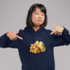 Woman wearing a navy blue hoodie sweatshirt with an image of tater tots and two pears printed on the front.