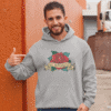 Man wearing light grey hoodie sweatshirt with funny image of an old school rose flash tattoo with the words 'No ragrets' intentionally misspelled.